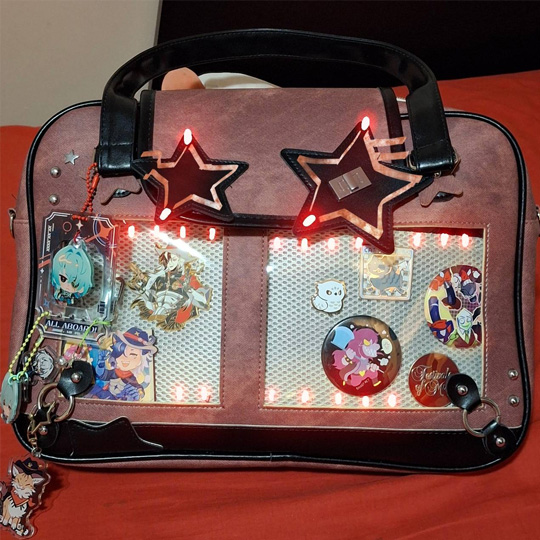 Mockup of the bag with all the lights switched on. The lights emphasize showcasing the objects within it, which enchance the effect the original bag tries to get across on another level 