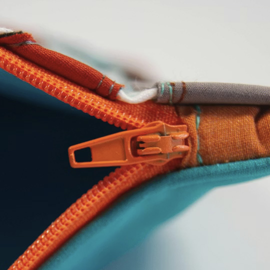 <br><audio controls src='/audio/zipper.mp3'></audio><br>Sound of a zipper being used both ways. I wear a lot of jackets, sweaters, and boots with zippers so I hear this sound often<br>/Cuk. N (2021). red and black zip pouch. Unsplash. https://unsplash.com/photos/red-and-black-zip-pouch-rObMPaCjEcE