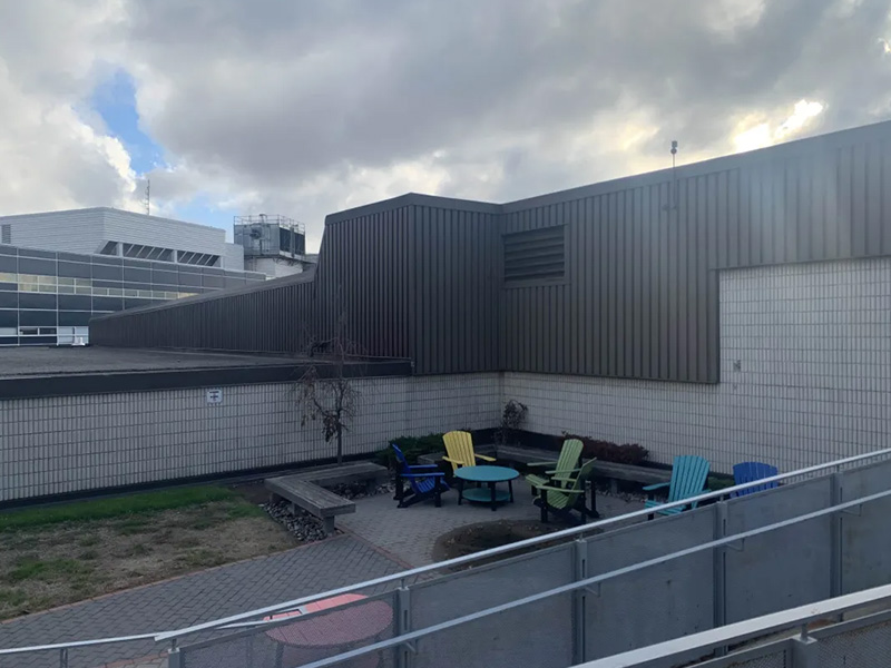 This is a small lounge outside the campus that’s relatively hidden. Before this workshop I honestly did not know this place existed. It seems to be a place where people should be able to relax or study, but it looks pretty dreary and a bit oppressive since its stuck in the middle of  multiple high walls. The furniture here also looks like an afterthought, almost looking out of place considering their placement and how they stand out against the greys of this area.