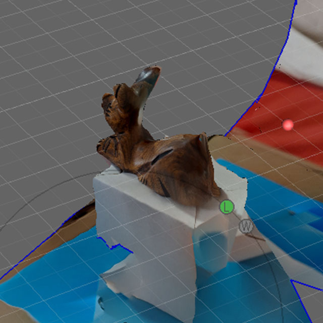 This mesh was one of the rabbit statue I ended up editing for my final project. Compared to other variations, it interpreted the form of the rabbit the best and had the least amount of melting.