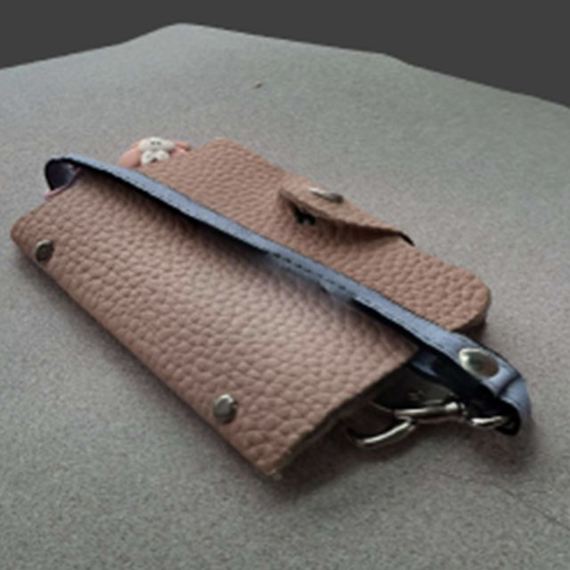 This is a scan of a small card holder that I scanned to see how Scaniverse would interpret the texture of the leather. It had the same issue as the previous models with it looking all melty 